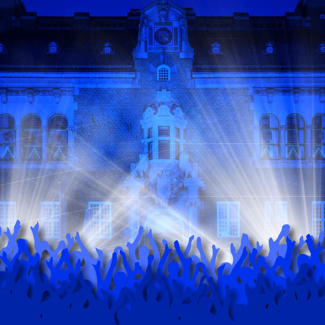 publik, ljuseffekter framför äldre byggnad